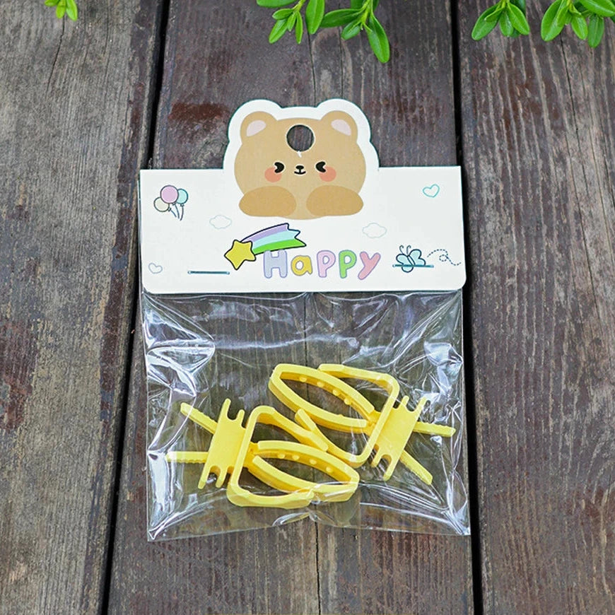 Pince porte-fruits pour cage - système de fixation